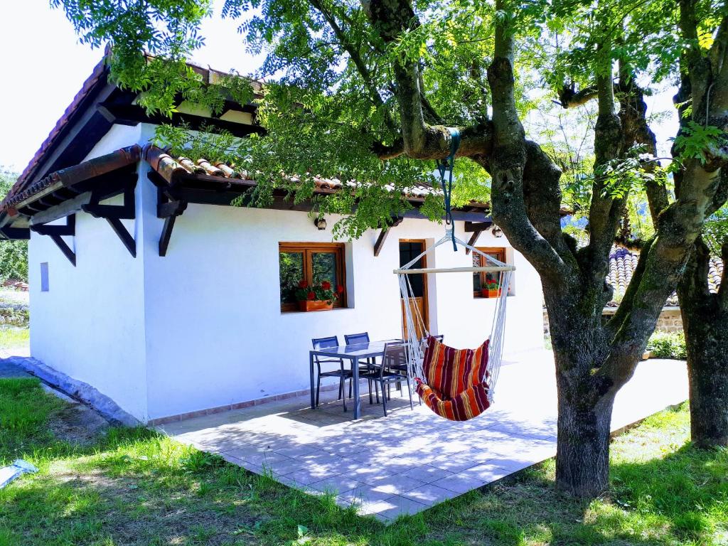 La casa, la terraza y la hamaca